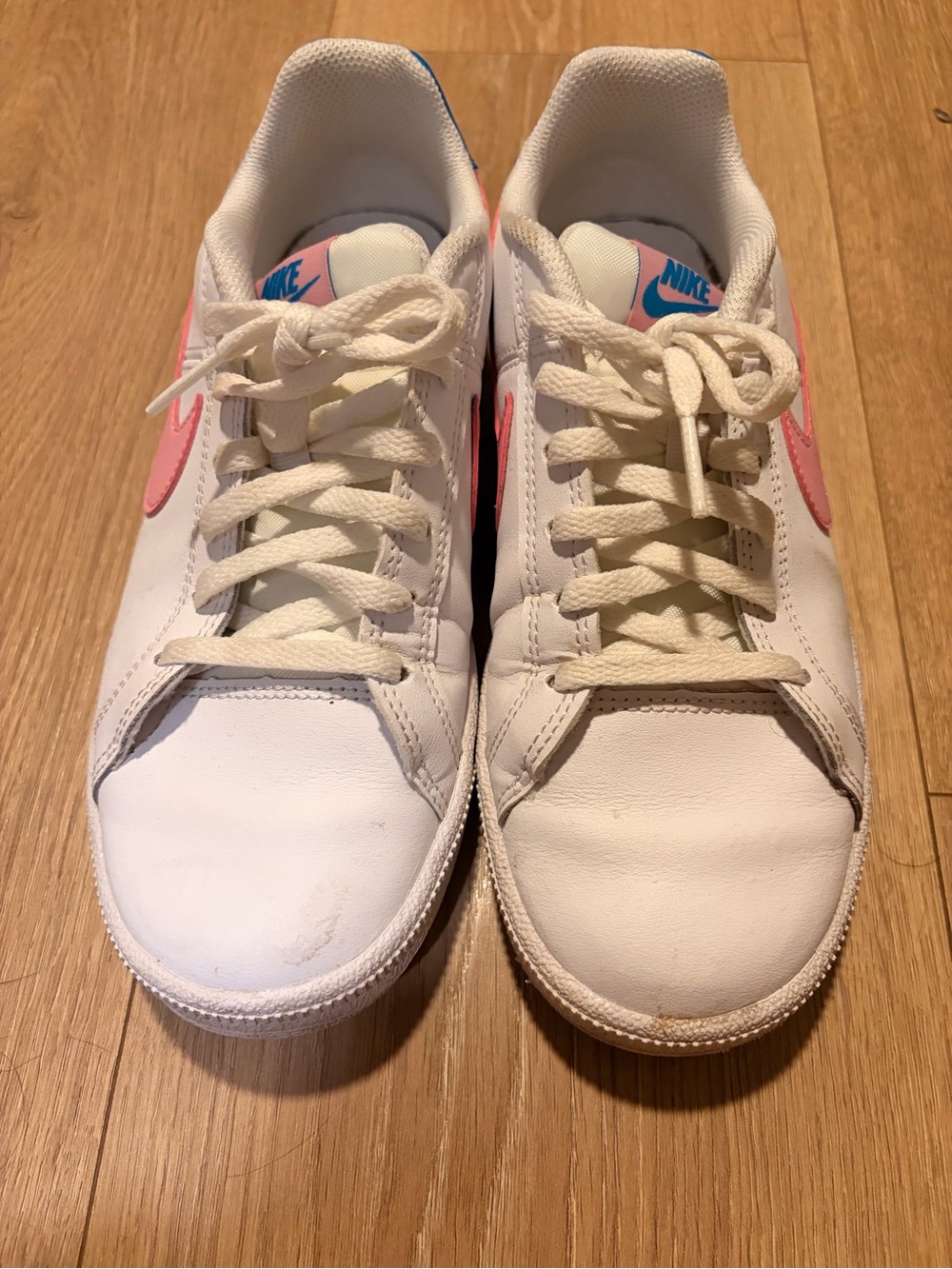 Nike Kids White Sneakers with Pink Swoosh